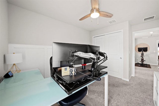 2760 Scarlet Bay Pl, Brandon, FL 33510 - carpeted office space with visible vents, a decorative wall, a ceiling fan, and a wainscoted wall