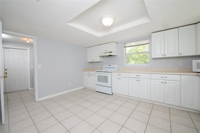 kitchen featuring under cabinet range hood, light countertops, white cabinets, and white appliances