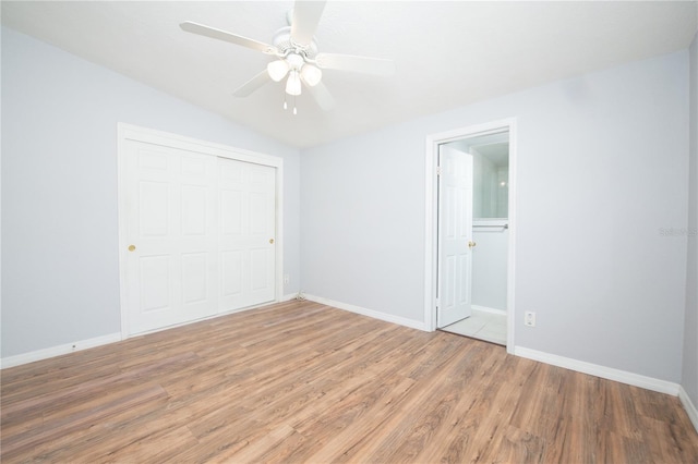 unfurnished bedroom with light wood finished floors, baseboards, a closet, and a ceiling fan