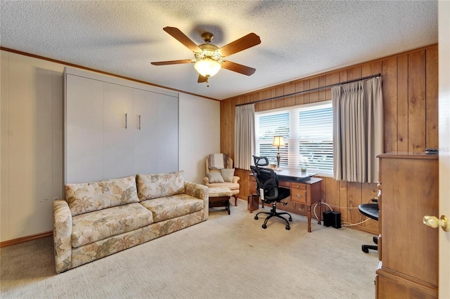 2007 E View Dr, Sun City Center, FL 33573 - carpeted office with wooden walls, ornamental molding, a ceiling fan, and a textured ceiling