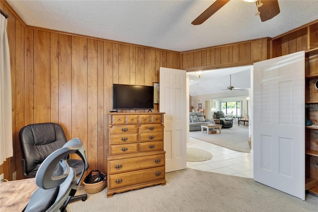 2007 E View Dr, Sun City Center, FL 33573 - home office featuring light carpet, wood walls, a textured ceiling, and a ceiling fan