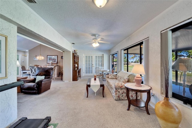2007 E View Dr, Sun City Center, FL 33573 - living area featuring carpet floors, french doors, and a textured wall