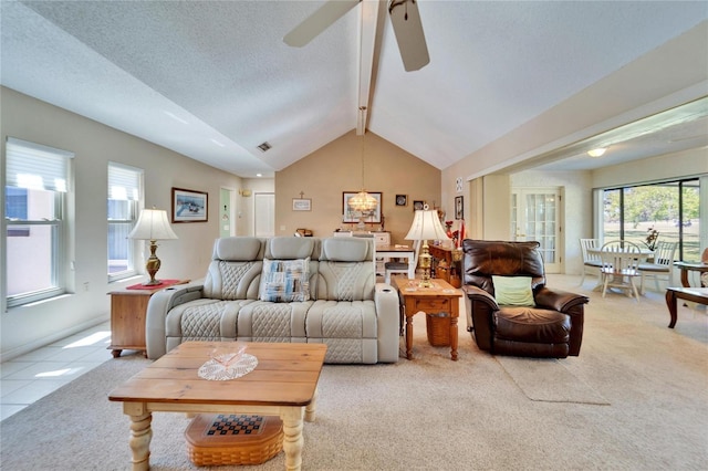 2007 E View Dr, Sun City Center, FL 33573 - living area with visible vents, lofted ceiling with beams, a textured ceiling, ceiling fan with notable chandelier, and light colored carpet