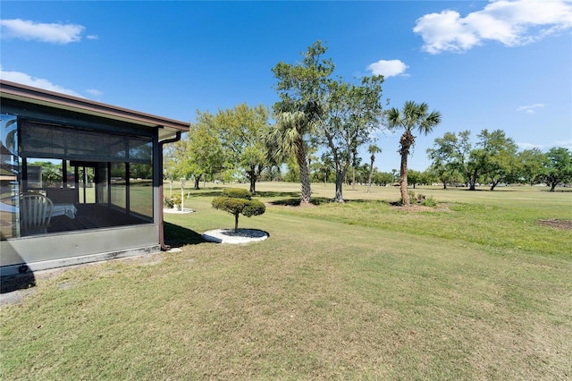 2007 E View Dr, Sun City Center, FL 33573 - view of yard featuring a sunroom