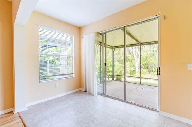 empty room with baseboards