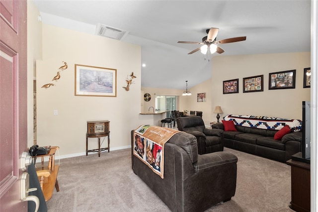 living room with visible vents, baseboards, light colored carpet, lofted ceiling, and a ceiling fan