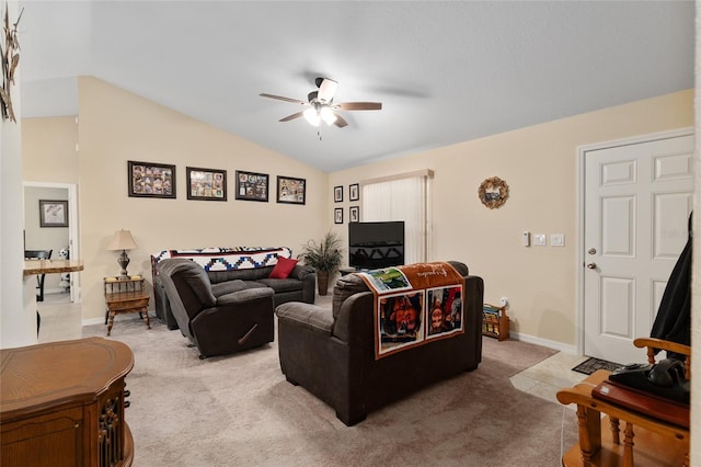 living room with light carpet, lofted ceiling, a ceiling fan, and light tile patterned flooring