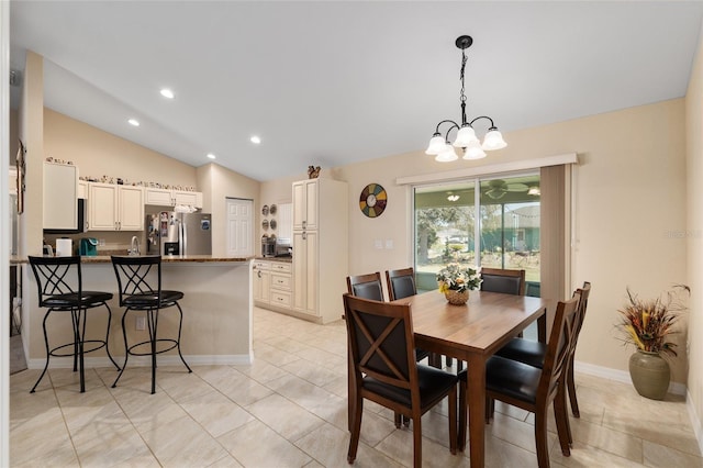 dining room featuring a notable chandelier, recessed lighting, light tile patterned floors, baseboards, and vaulted ceiling
