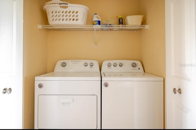 19829 Gulf Blvd Unit 601, Indian Shores, FL 33785 - laundry room with washer and dryer and laundry area