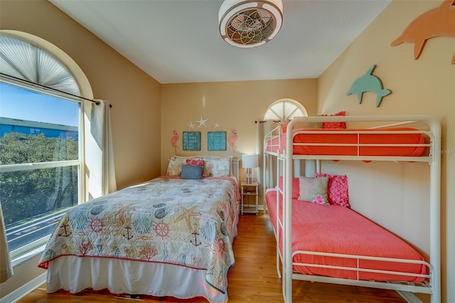 19829 Gulf Blvd Unit 601, Indian Shores, FL 33785 - bedroom with lofted ceiling and wood finished floors
