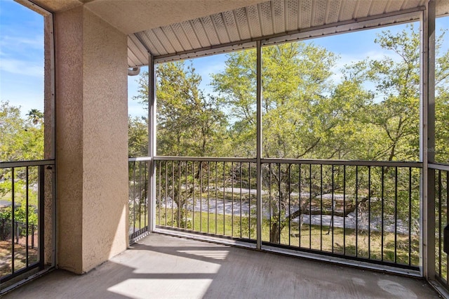 unfurnished sunroom featuring a healthy amount of sunlight