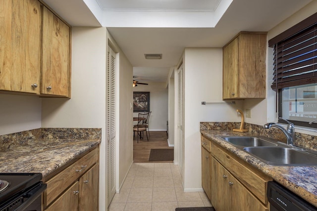 9860 62nd Ter N Unit 1051, Saint Petersburg, FL 33708 - kitchen featuring light tile patterned floors, baseboards, a sink, visible vents, and dishwasher