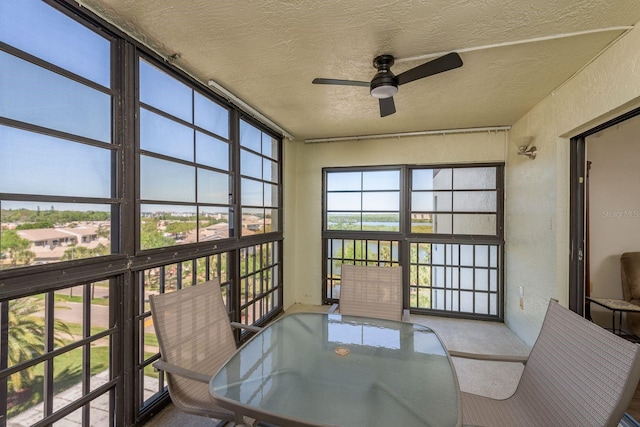 9860 62nd Ter N Unit 1051, Saint Petersburg, FL 33708 - sunroom / solarium with a textured wall and a textured ceiling