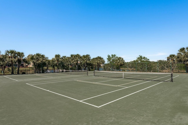 9860 62nd Ter N Unit 1051, Saint Petersburg, FL 33708 - view of sport court featuring community basketball court and fence