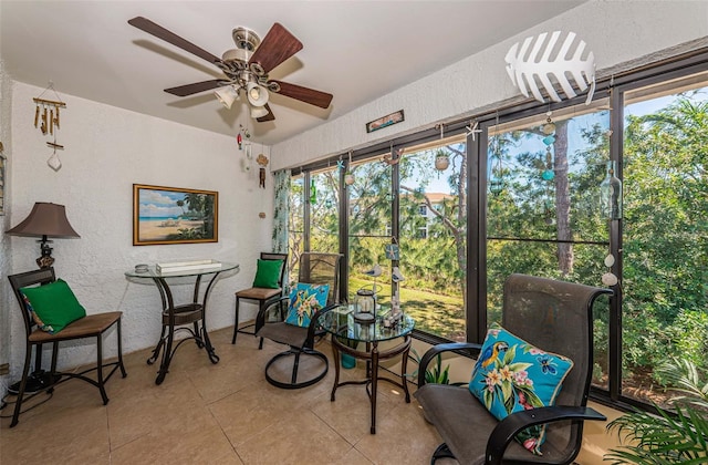 sunroom / solarium with ceiling fan