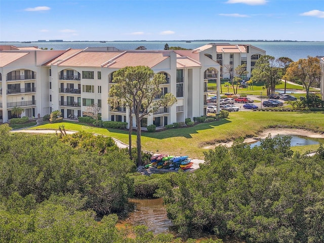 drone / aerial view featuring a water view