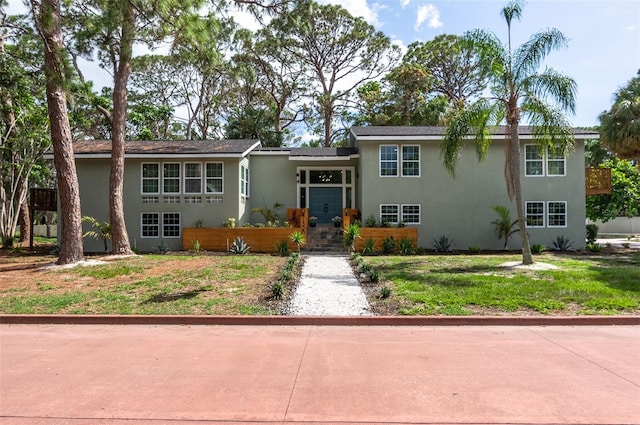 1320 Coral Way S, Saint Petersburg, FL 33705 - tri-level home with stucco siding and a front yard