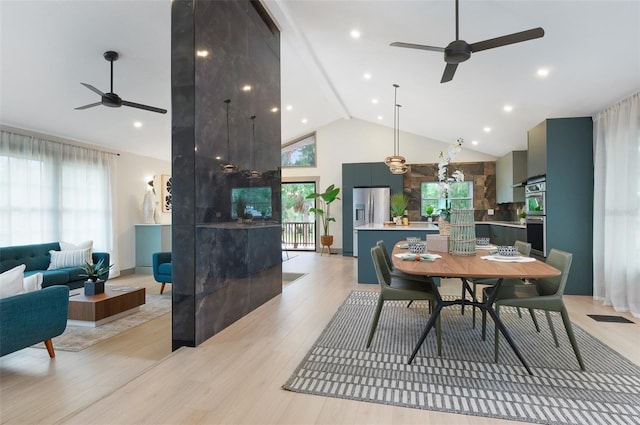 1320 Coral Way S, Saint Petersburg, FL 33705 - dining space featuring ceiling fan, high vaulted ceiling, healthy amount of natural light, light wood-style flooring, and recessed lighting