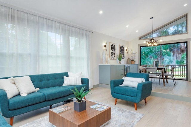 1320 Coral Way S, Saint Petersburg, FL 33705 - living room with light wood-style floors, recessed lighting, and high vaulted ceiling