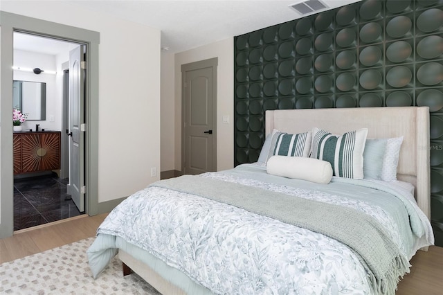 1320 Coral Way S, Saint Petersburg, FL 33705 - bedroom featuring wood finished floors