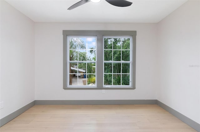1320 Coral Way S, Saint Petersburg, FL 33705 - unfurnished room featuring ceiling fan and light wood finished floors