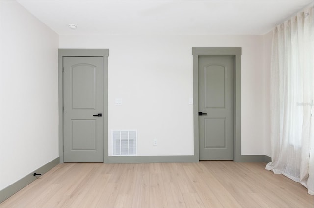 1320 Coral Way S, Saint Petersburg, FL 33705 - unfurnished room with wood finished floors