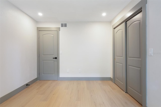 1320 Coral Way S, Saint Petersburg, FL 33705 - unfurnished room featuring light wood-style flooring and recessed lighting