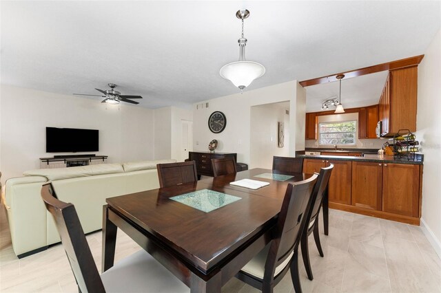 2700 Bayshore Blvd Unit 512, Dunedin, FL 34698 - dining room with ceiling fan