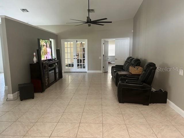 14305 Tennyson Dr, Hudson, FL 34667 - living area featuring french doors, visible vents, a ceiling fan, light tile patterned floors, and baseboards