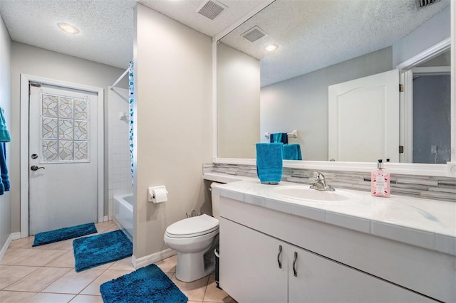 full bath with vanity, tile patterned floors, toilet, and visible vents