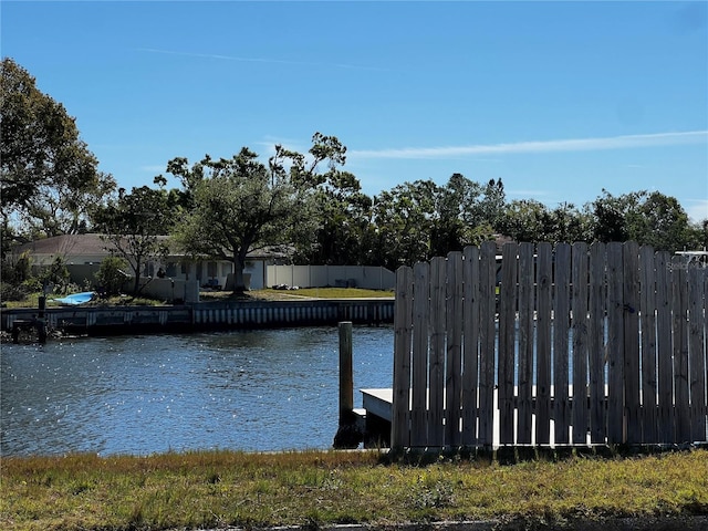view of water feature with fence