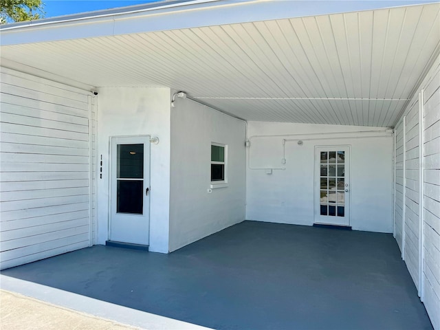 view of patio featuring an attached carport