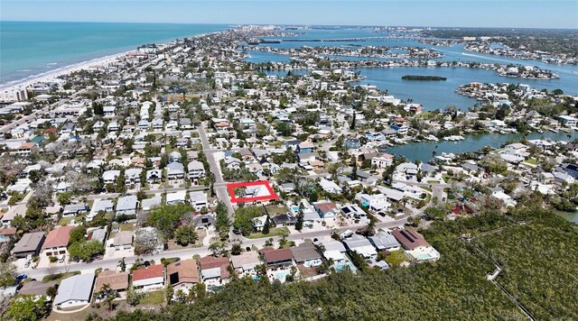 drone / aerial view with a residential view and a water view