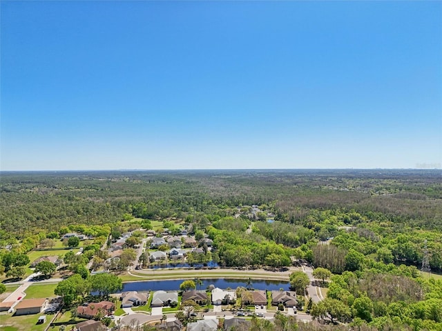 954 Cobblestone Ln, Tarpon Springs, FL 34688 - birds eye view of property featuring a water view, a residential view, and a forest view