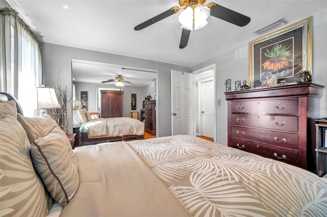 10035 Cherry Creek Ln, Port Richey, FL 34668 - bedroom featuring a closet, visible vents, and a ceiling fan