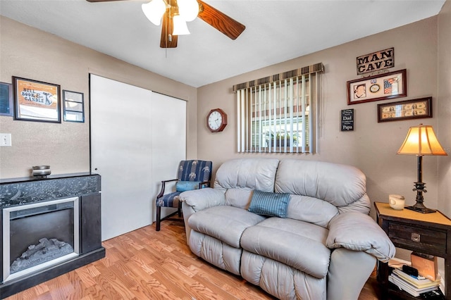 10035 Cherry Creek Ln, Port Richey, FL 34668 - living room with light wood-style flooring and a ceiling fan