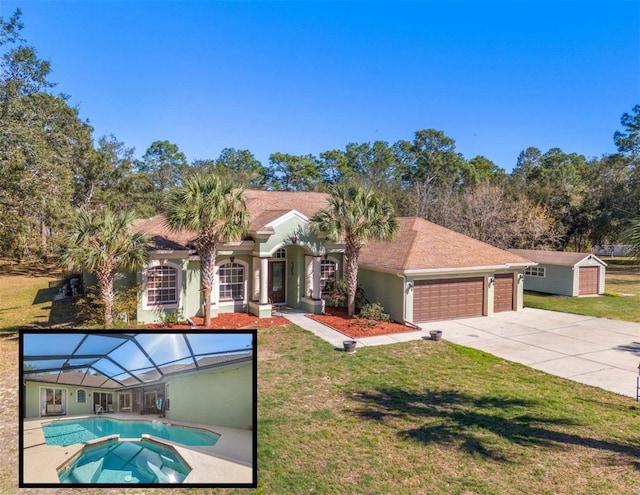 16340 Marquis Rd, Brooksville, FL 34614 - mediterranean / spanish-style house featuring a garage, an outdoor pool, concrete driveway, and a front yard