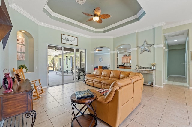 16340 Marquis Rd, Brooksville, FL 34614 - living room featuring a ceiling fan, arched walkways, and ornate columns