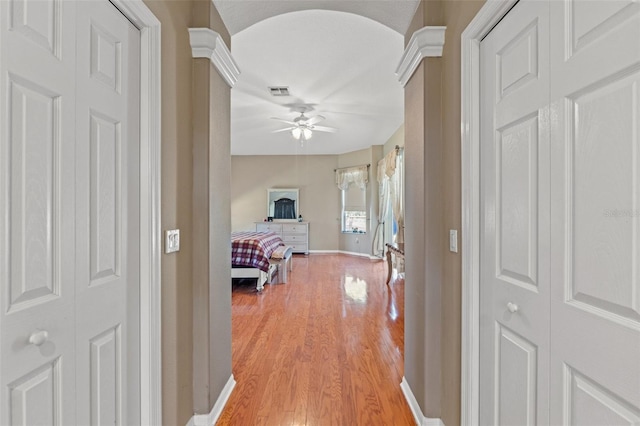 16340 Marquis Rd, Brooksville, FL 34614 - corridor with light wood finished floors, visible vents, and baseboards