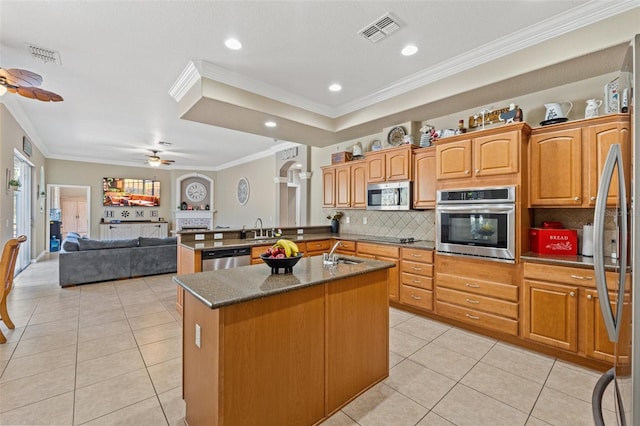 16340 Marquis Rd, Brooksville, FL 34614 - kitchen featuring light tile patterned floors, visible vents, appliances with stainless steel finishes, and a sink