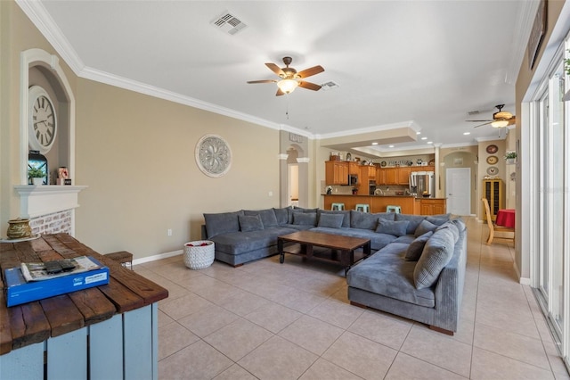 16340 Marquis Rd, Brooksville, FL 34614 - living area featuring light tile patterned floors, visible vents, ceiling fan, and crown molding