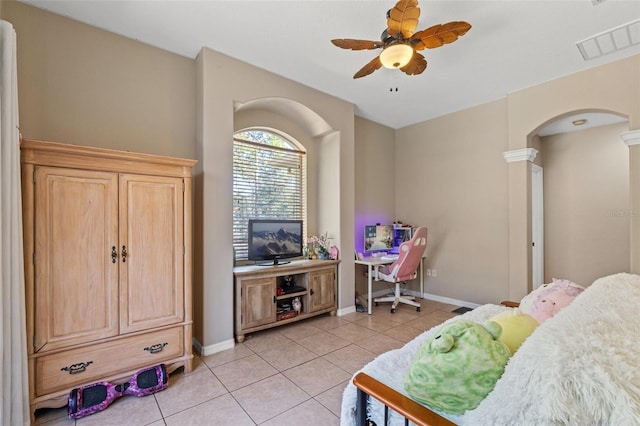 16340 Marquis Rd, Brooksville, FL 34614 - bedroom featuring light tile patterned floors, visible vents, arched walkways, and baseboards