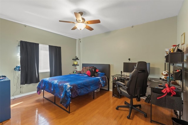 16340 Marquis Rd, Brooksville, FL 34614 - bedroom with ceiling fan, baseboards, and wood finished floors