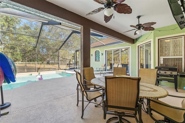 16340 Marquis Rd, Brooksville, FL 34614 - sunroom with outdoor dining space, a swimming pool, and a ceiling fan