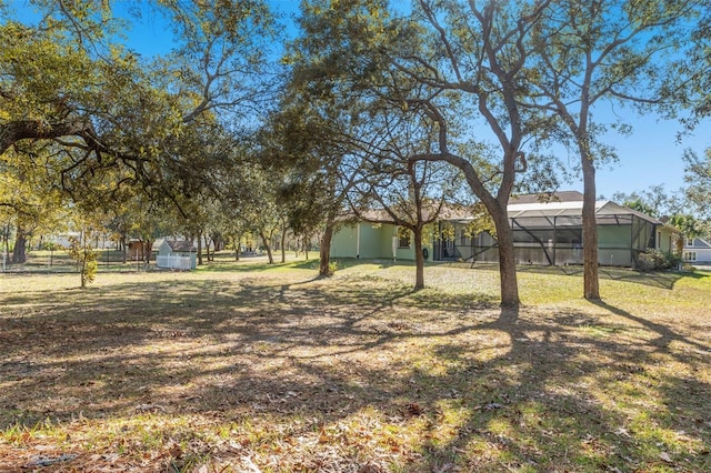 16340 Marquis Rd, Brooksville, FL 34614 - view of yard featuring a lanai