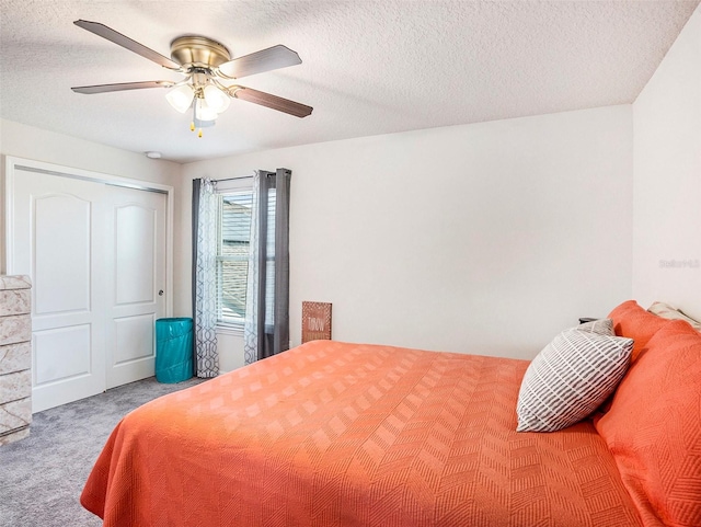 7494 Pool Compass Loop, Wesley Chapel, FL 33545 - carpeted bedroom with ceiling fan and a textured ceiling