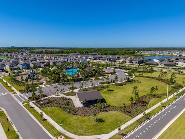 aerial view with a residential view and a water view