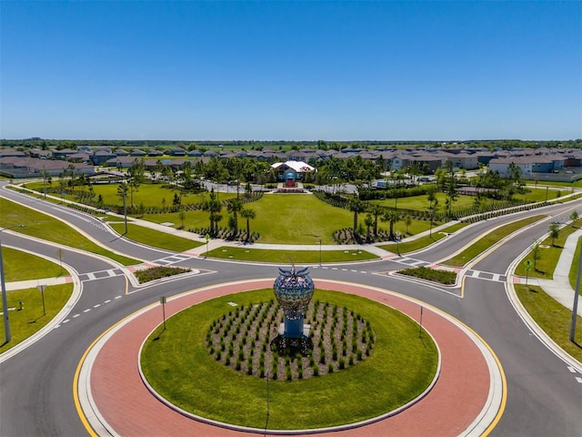birds eye view of property with a residential view