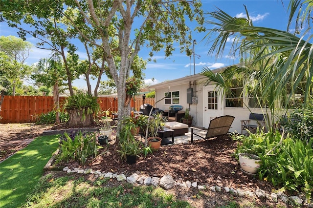 view of yard featuring fence and a patio area