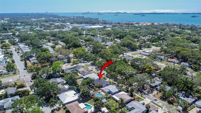 bird's eye view featuring a residential view and a water view